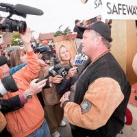 2009 winner Don Young talks with the press