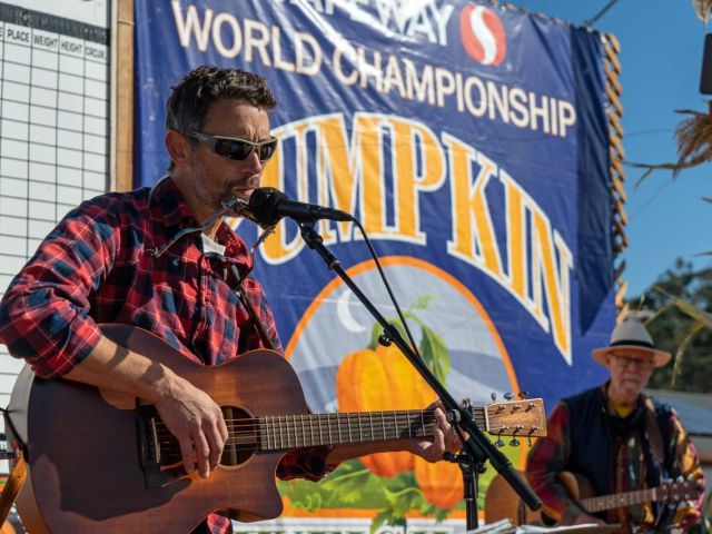 Weighing heavyweight pumpkins is interspersed with musical entertainment